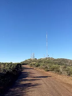 RADIO FOR YOU: The towers looming from Tassajara Peak bring residents what they need, and you can trek up there and back from the road if you feel like adding another 0.4 miles to your hike. - PHOTO BY CAMILLIA LANHAM