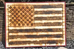 ’MERICA : Los Angeles based artist Scott Froschauer creates images using gun powder, like this American flag piece titled 'Old Glory.' - PHOTO COURTESY OF SCOTT FROSCHAUER