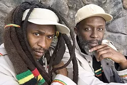 MESSENGERS: Lead singer, guitarist, and songwriter David “Dread” Hinds (left), keyboardist Selwyn “Bumbo” Brown (right), and their band Steel Pulse bring their socially conscious message to Fremont Theater on Feb.11. - PHOTO COURTESY OF STEEL PULSE