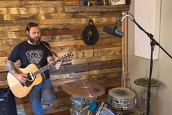CREATION JUNKIE : Jon Bartel of the rock band American Dirt and the country act The Creston Line treats his home recording studio as therapy. - PHOTO BY JAYSON MELLOM