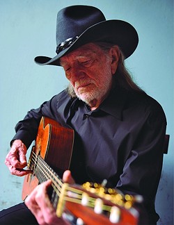 WILLIE & TRIGGER:  Country superstar Willie Nelson and his beloved Martin guitar, Trigger, appear at the Avila Beach Resort on Oct. 21. - PHOTO COURTESY OF WILLIE NELSON