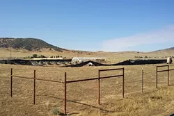 LET 'EM GROW: The SLO County Board of Supervisors decided on Sept. 20 that marijuana grows like this one in the California Valley would have to register with the county and be brought up to county building codes in order to continue operating. - PHOTO COURTESY OF JOHN WILSON