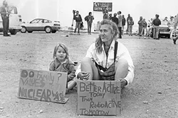 A BLAST FROM THE PAST: Crowds of activists work to stop the Diablo Canyon Nuclear Power Plan from opening in the 1980s. - FILE PHOTO