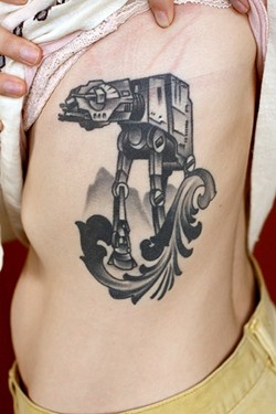 THAT TORSO THO:  The side panel/rib area is a popular go-to spot for tattoos that can also be concealed. Star Wars AT-AT walker tattoo art by Jake Schroeder. - PHOTO COURTESY OF JAKE SCHROEDER