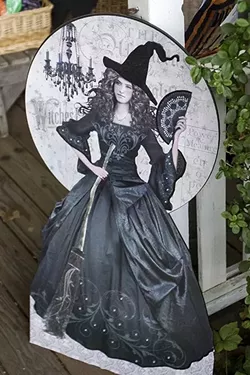 LIFTING THE VEIL: Before Cambria became overrun with scarecrows each fall, one raven-cloaked “herbie” brought Halloween out of the shadows once and for all. - PHOTO BY JAYSON MELLOM