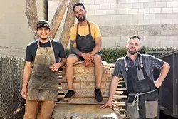 PASSION: The Deadwood Revival trio makes unique furniture pieces by salvaging fallen or dead trees throughout San Luis Obispo County. - PHOTO BY KAREN GARCIA