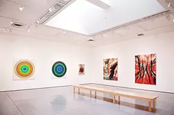 ART ON DISPLAY: Artist Don Suggs’ series of abstract landscapes hang at Cuesta’s gallery earlier this year. - PHOTO COURTESY OF CUESTA COLLEGE