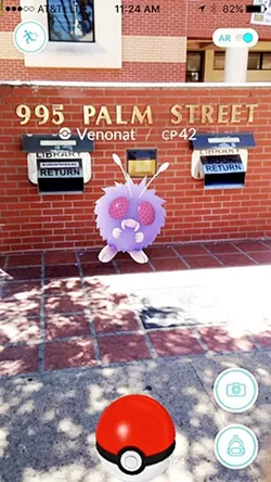 STUDYING UP: A Venonat lurks near the book return slot at the public library in downtown SLO. - SCREENSHOT BY KATRINA BORGES