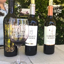 POPPIN&rsquo; BOTTLES :  Hope Family Wines was just one of the many wineries pouring red blends, cabernets, ros&eacute; wines, and more at the Paso Robles Wine Festival on May 20. - PHOTO BY RYAH COOLEY