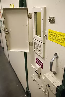 LOCKDOWN: Inmates declared incompetent to stand trial spend weeks, and sometimes months, in isolation while waiting to be transferred to a mental health facility for treatment. - PHOTO BY JAYSON MELLOM