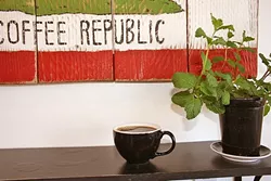A BEE GETS ITS WINGS: Red Bee Coffee, Grover Beach’s first third-wave coffee shop, exclusively pours SoCal Klatch coffee, which is both accessible and artful. - PHOTO BY HAYLEY THOMAS CAIN