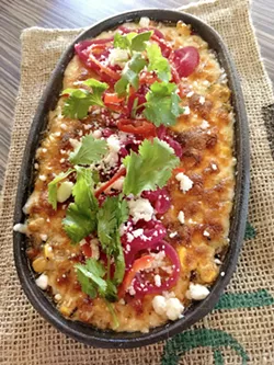 SHARING IS CARING The Vegetable Butcher's Queso Fundido is perfect for sharing with friends over a glass of wine or craft beer. - PHOTO BY REID CAIN