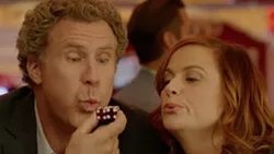 RISKY BUSINESS Two financially strapped parents (Will Ferrell and Amy Poehler) start a secret casino in a friend's basement to pay for their daughter's college tuition in The House. - PHOTO COURTESY OF WARNER BROS. PICTURES