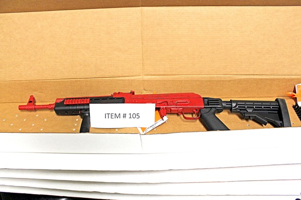 HARDWARE Investigators recovered seven firearms, including this custom-painted AK-47, in connection with the cocaine trafficking case. - PHOTO COURTESY OF SLO COUNTY SHERIFF'S OFFICE