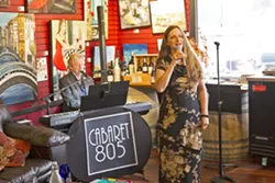 CABARET, SLO STYLE Valerie Pallai, a singer with local group Cabaret 805, finishes a performance at Stax Wine Bar in Morro Bay. - PHOTO BY JAYSON MELLOM