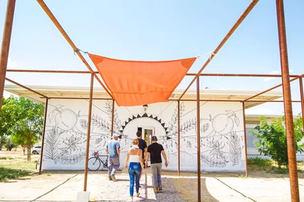 REACHING THE SUMMIT In May, the Blue Sky Center in Cuyama hosted the two-day Rural Summit, during which artists, students, government officials, nonprofits, and community members shared meals and gathered momentum for making positive changes in the town. - PHOTO BY JAYSON MELLOM