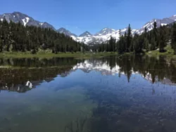 NICE PEAKS Looking over Marsh Lake into the John Muir Wilderness, the snow level in the Sierra Nevada is much lower than it has been the past few years. - PHOTO BY CAMILLIA LANHAM