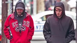 HE AIN'T HEAVY Connie Nikas (Robert Pattinson, left) will do anything to protect his brother Nick (Benny Safdie). - PHOTO COURTESY OF ELARA PICTURES