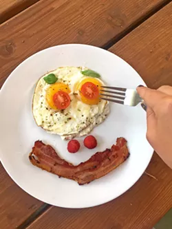 SUNNY SIDE WHAT? Whether scrambled, poached, fried with a runny yolk or simmered solid, an egg is really never just an egg. Just ask the masses: No one person takes theirs exactly the same. That would just be creepy. - PHOTO BY HAYLEY THOMAS CAIN