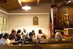 PRACTICE Anita Schwaber of By the Sea Productions (far left) and cast members read a script for their upcoming play, Member of the Wedding, at St. Peter's By The Sea Episcopal Church in Morro Bay. - PHOTO BY JAYSON MELLOM