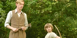 HUNDRED ACRE WOOD Author A.A. Milne (Domhnall Gleeson) finds inspiration to write Winnie the Pooh thanks to his son, Christopher Robin (Will Tilston), in Goodbye Christopher Robin. - PHOTO COURTESY OF FOX SEARCHLIGHT PICTURES
