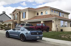 LAP OF LUXURY Multi-millionaire lotto winner Charles Hairston gifted this $819,000 home and a 2016 Porsche to Tiffany Borba, an unlicensed caregiver who now has power of attorney over his finances and medical care. - PHOTO BY JAYSON MELLOM