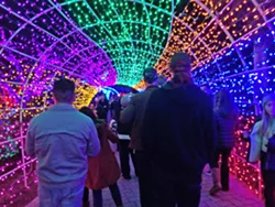 MERRY AND BRIGHT The tunnel of lights at the V.C. Cambria Christmas Market is a popular spot for photos and is the inspiration for many a festive Instagram post. - PHOTO BY RYAH COOLEY