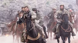 HORSE SOLDIERS In the aftermath of 9/11, Capt. Mitch Nelson (Chris Hemsworth) leads a U.S. Special Forces team into Afghanistan on a dangerous mission in 12 Strong. - PHOTO COURTESY OF WARNER BROS. PICTURES