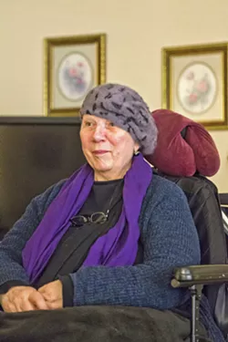 LONG ROAD TO HOUSING Anne Ramirez, 69, suffers from a condition resembling multiple sclerosis. Finding consistent housing was a struggle for her until she moved into the Brizzolara Apartments in 2000. She's lived happily there ever since. - PHOTO BY JAYSON MELLOM