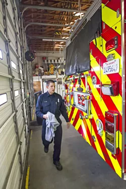 SIDE HUSTLES When Jeff Lane isn't working for the fire department he picks up professional photography and construction jobs to make money. - PHOTO BY JAYSON MELLOM