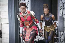 POWERFUL WOMEN Nakia (Lupita Nyong'o, left) and Shuri (Letitia Wright) join in the fight for Wakanda, proving themselves equal to men. - PHOTO COURTESY OF MARVEL STUDIOS AND WALT DISNEY PICTURES