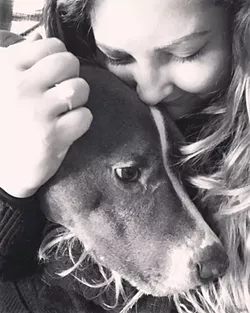 FAMILY MATTERS There is a lot more love in Davis' life, but her No. 1 love is her pit bull Diesel. - PHOTOS COURTESY OF AMBER DAVIS
