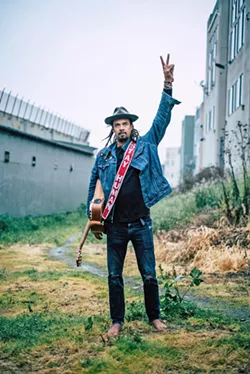 STAY HUMAN Michael Franti and Spearhead play a special KCBX fundraiser on June 14, at Camp Live Oak, the day before the official start of the Live Oak Music Festival. - PHOTO COURTESY OF MICHAEL FRANTI