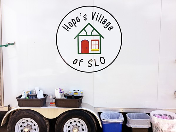 COMMUNITY PROJECT Hope's Village of SLO works with the homeless community by providing showers, clean clothes, and food to those in need. - PHOTO BY KAREN GARCIA