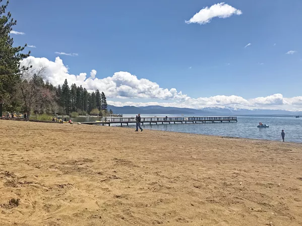 THE BEACH Though it's not the ocean, Kings Beach in Lake Tahoe does have the requisite sand and water needed for summer fun. - PHOTO BY RYAH COOLEY