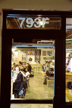 STUDY BUDDIES Sure it's 3:30 a.m. at SloDoCo, but Cal Poly students are still at it. The studying never stops when the fried bacon-glazed doughnuts are available 24/7. - PHOTO BY JAYSON MELLOM
