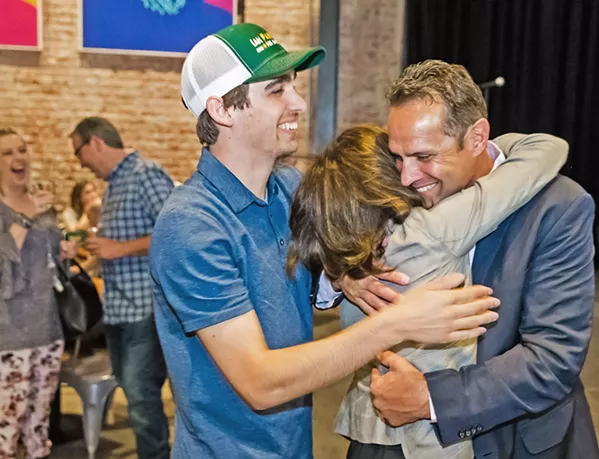 VICTORY SLO County Sheriff Ian Parkinson celebrates with his family after preliminary election results show him winning a third term. Parkinson faced a difficult and acrimonious campaign against his challenger, local private investigator Greg Clayton. - PHOTO BY JAYSON MELLOM