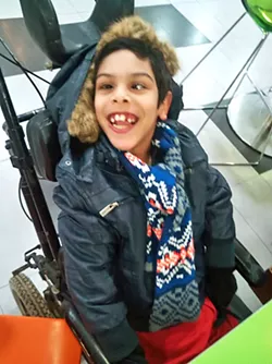 SENDING AID Nizar Khalid is a 9-year-old boy living with seizures, cerebral palsy, and scoliosis with limited access to health care. - PHOTO COURTESY OF SENECA JOHNSON