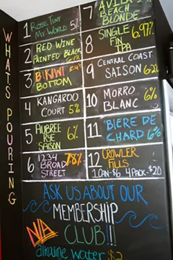 WILD TIDE You will not find seashells or quaint "this way to the beach" ephemera at Libertine's third taproom location. The bold Avila Beach hangout features a dozen taps, video game corner, breezy patio, and quirky vinyl selections. - PHOTO BY HAYLEY THOMAS CAIN