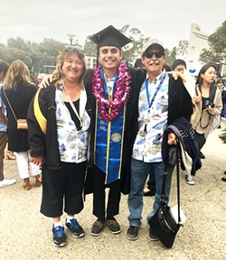 POMP AND CIRCUMSTANCE The weekend kicks off with my brother's graduation ceremony. Here he is sandwiched between my parents (notice their adorable, matching shirts). - PHOTO BY CALEB WISEBLOOD