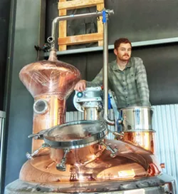 A DREAM, DISTILLED Calwise Distillery Master Distiller Aaron Bergh opened a new, 6,000-square-foot distillery and tasting room in Paso Robles. - PHOTO COURTESY OF CALWISE