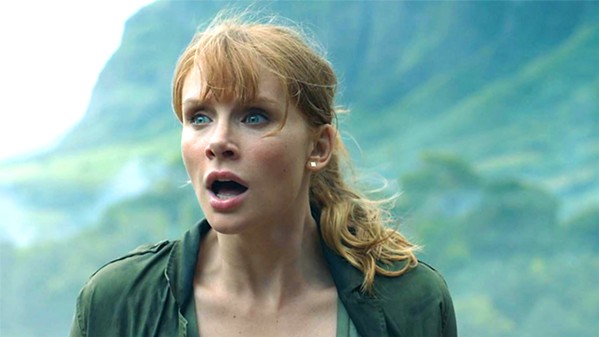 PAWN? Claire Dearing (Bryce Dallas Howard) is hired to mount a rescue mission to save dinosaurs on a volcanic island, but what's driving the rescue mission? - PHOTO COURTESY OF AMBLIN ENTERTAINMENT