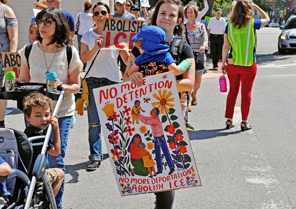GET OUT Locals rallied against immigration policies at a June 30 protest at the SLO County courthouse (pictured), while candidates running for elected office in November are taking sides on the issue of dismantling U.S. Immigration and Customs Enforcement (ICE). The agency faced heavy criticism for its role in separating undocumented children from their parents at the U.S. border earlier this year. - PHOTO BY ASHLEY LADIN