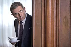 ENGLISH, JOHNNY ENGLISH Rowan Atkinson reprises his role as a bumbling British secret agent in the spy spoof Johnny English Strikes Again. - PHOTO COURTESY OF PERFECT WORLD PICTURES