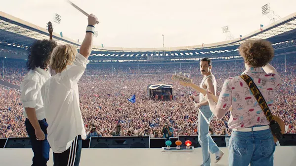 IS THIS THE REAL LIFE? The life and times of Freddie Mercury (Rami Malek) and the band Queen are chronicled in Bohemian Rhapsody. - PHOTO COURTESY OF NEW REGENCY PISTURES