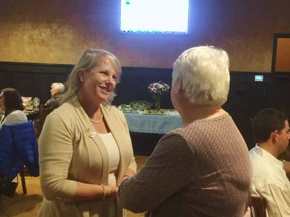 NEW MAYOR IN AG Councilmember Caren Ray greets a supporter at her election night party. Ray was narrowly ahead of two-time incumbent Jim Hill for the position of Arroyo Grande mayor, according to unofficial voting totals. - PHOTO BY CHRIS MCGUINNESS
