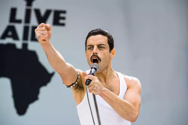 TRIUMPHANT RETURN After leaving Queen for an ill-fated solo career, Freddie Mercury (Rami Malek) and Queen re-formed in time to play the historic 1985 Live Aid concert. - PHOTO COURTESY OF NEW REGENCY PICTURES