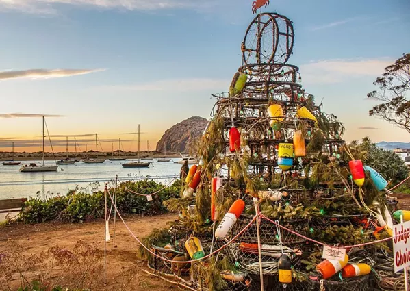 ALTERNATIVE CHRISTMAS TREES Teri Bayus got 12 individuals and businesses to put up crab pot Christmas trees last year; her goal is to have the trees all over the city's downtown area. - PHOTO COURTESY OF TERI BAYUS