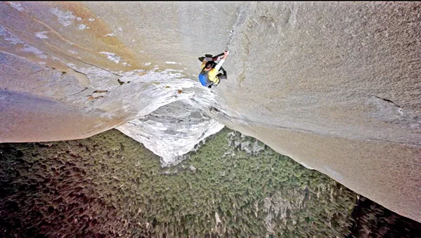 CLIMBING UP A rock climber ascends a granite face in Yosemite National Park in the film Valley Uprising, which will be featured on Nov. 29 as part of EcoWatch! Movie Nights at Green Goods in San Luis Obispo. - PHOTO COURTESY OF SENDER FILMS