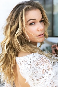 SANTA, BABY Country and pop sensation LeAnn Rimes presents her holiday show at the SLO Performing Arts Center on Dec. 18. - PHOTO COURTESY OF LEANN RIMES